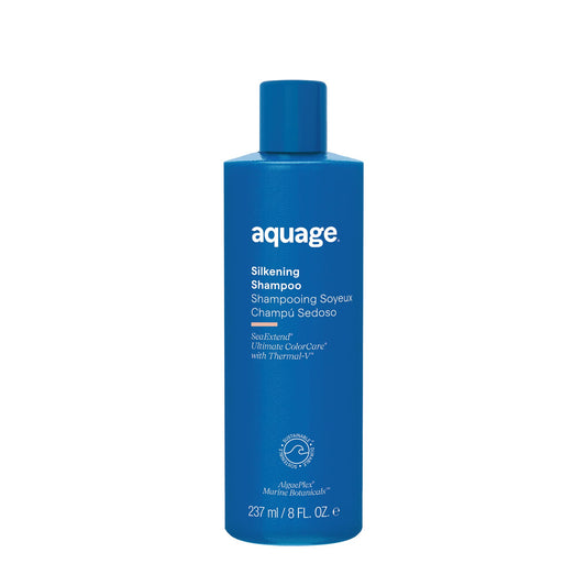 Aquage SeaExtend Silkening Shampoo bottle on a bathroom shelf for smooth, shiny hair.