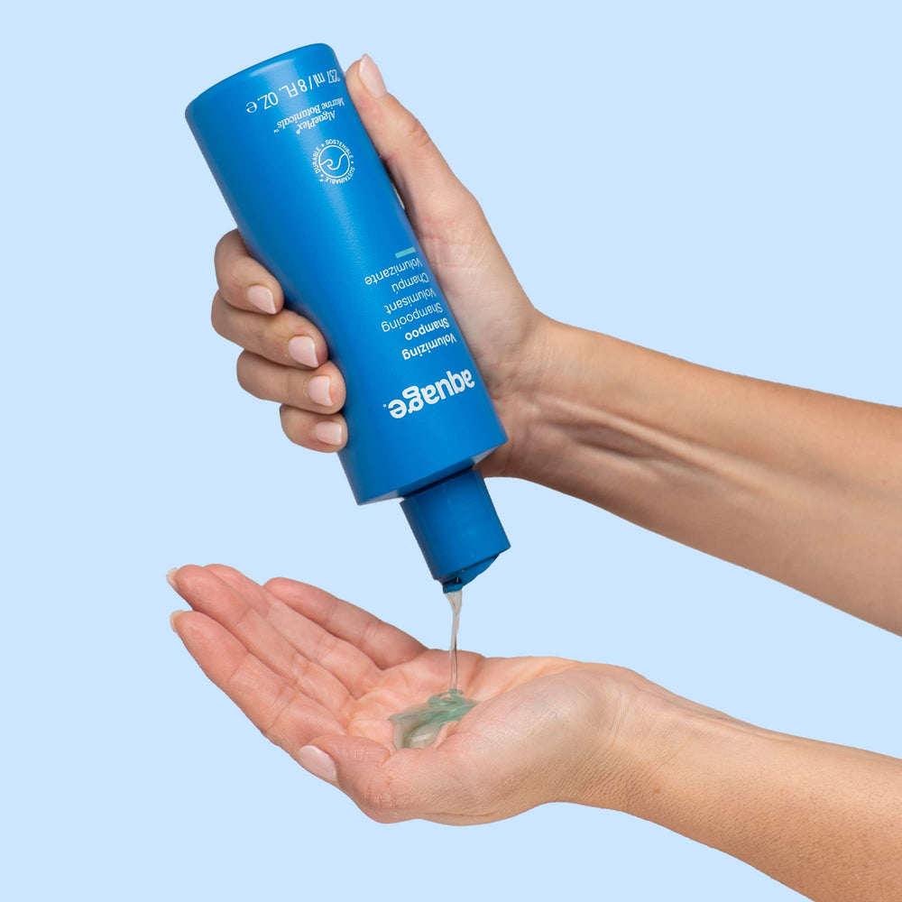 Aquage Volumizing Shampoo color-safe label indicating color-treated hair compatibility.