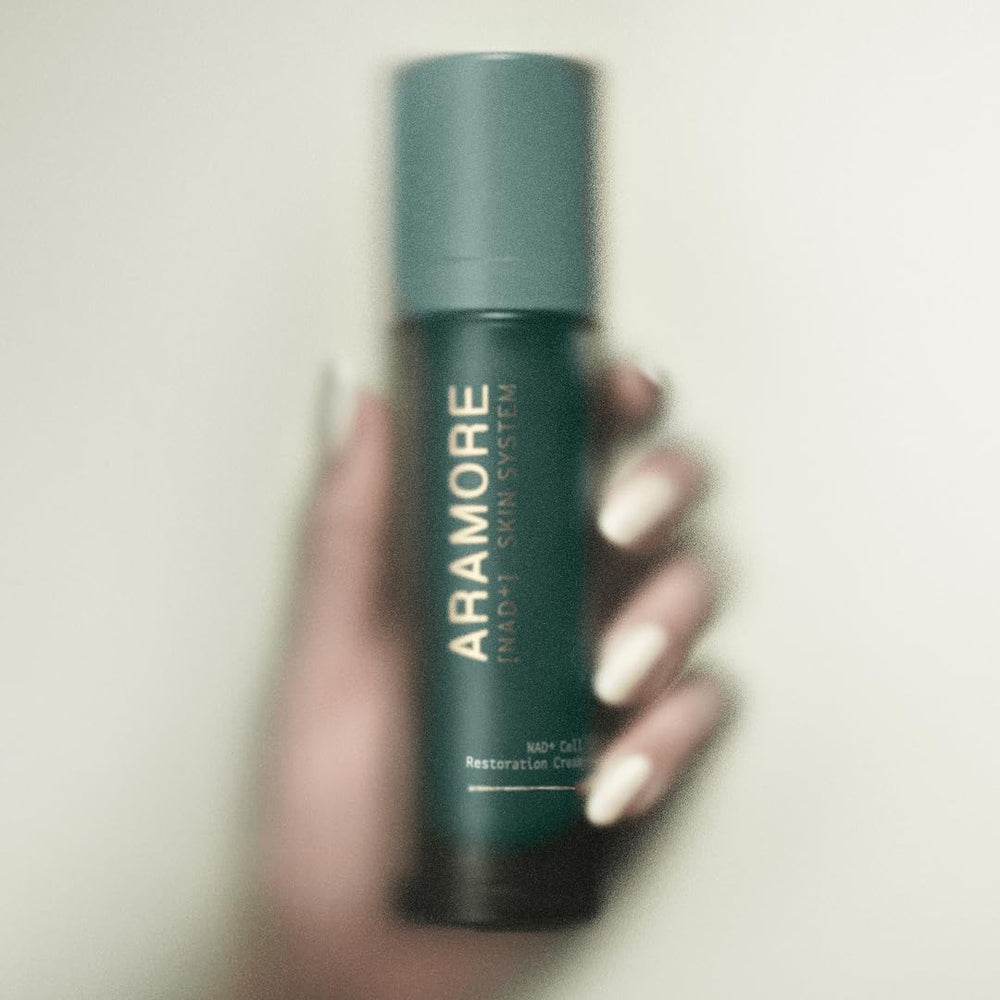 Aramore NAD+ Cream applied to the face with smooth absorption