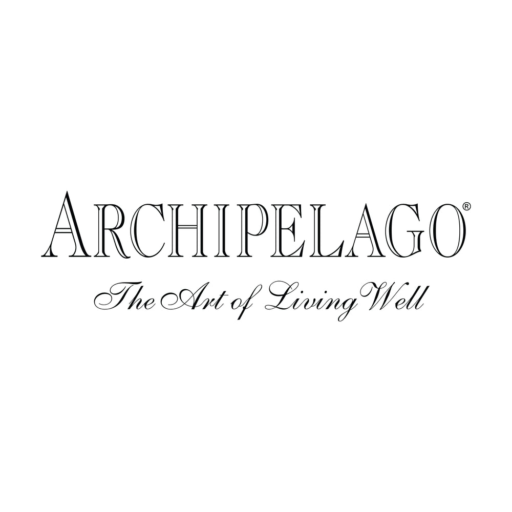 Archipelago Charcoal Rose application shot on pulse points for diffuse aroma.
