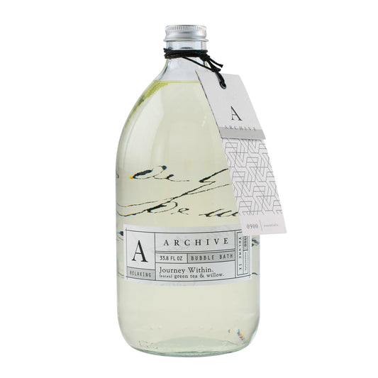 Archive Journey Within bubble bath being poured for a luxurious relaxing soak
