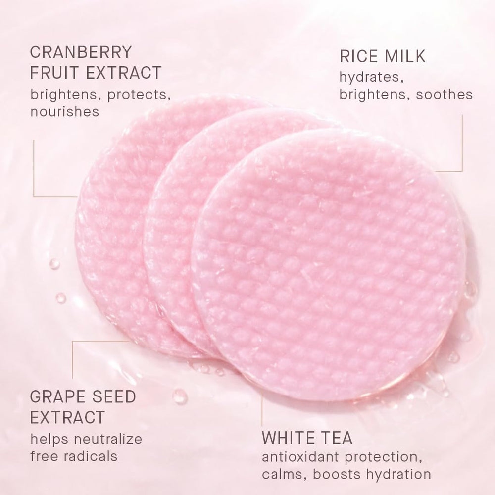 ARCONA Cranberry Triad Milky Toner Pads applied to the face for gentle cleansing and glow