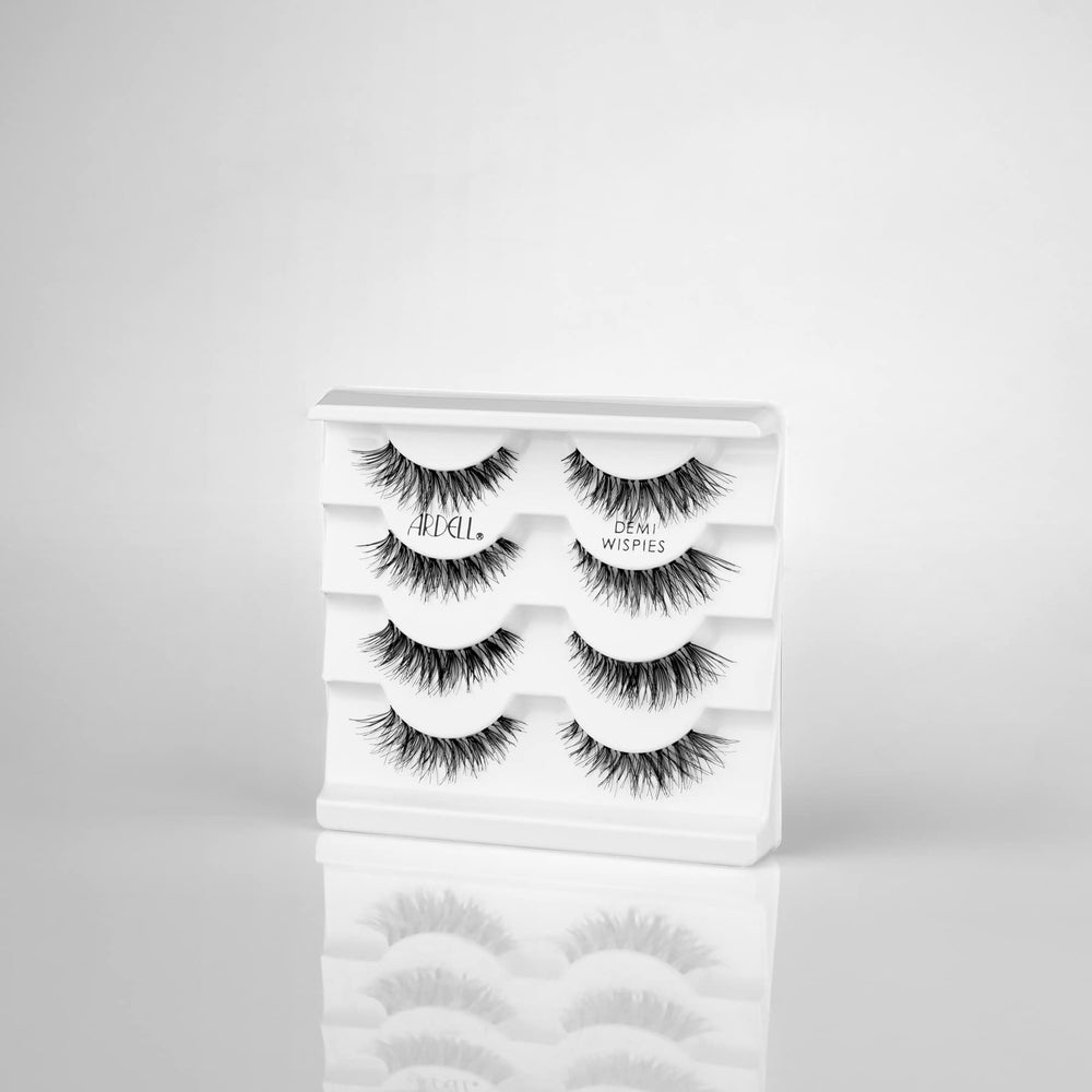 Ardell Demi Wispies strip application shows easy lash line alignment.
