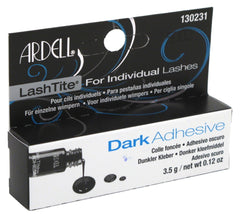 Ardell Lashtite dark adhesive packaging close-up shows three-pack and long-lasting hold.
