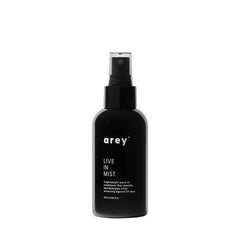 Arey Live-In Mist Leave-In Conditioner bottle highlighting lightweight hydration and UV protection