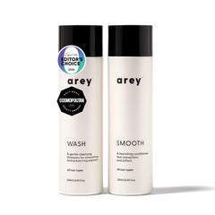 Arey Shower Duo shampoo bottle promotes pigment preservation and smoother hair