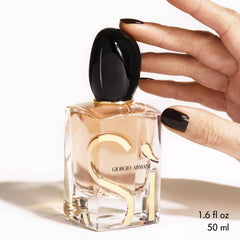 Armani Sì refillable bottle design signals eco-friendly choice and lasting value.