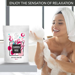 AROMATIKA bath soak pour image showing product in water with bubbles.