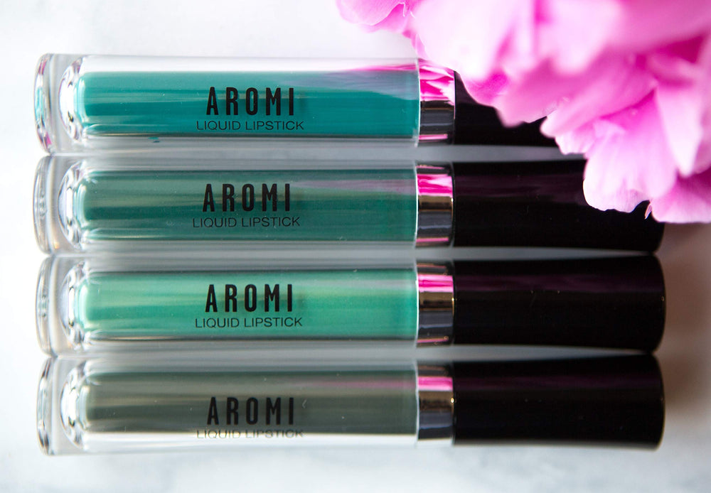 Aromi packaging closeup reveals vegan, cruelty-free commitment.
