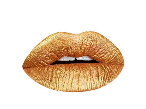 Aromi Gold Digger lipstick tube shows metallic bronze-yellow shimmer for bold evening looks.