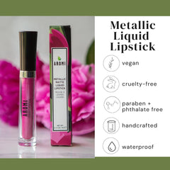 Aromi hot pink metallic lipstick being applied with a gloss-like glide