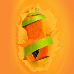 ASANTEE Papaya & Honey soap bar held in hand for travel cleansing.