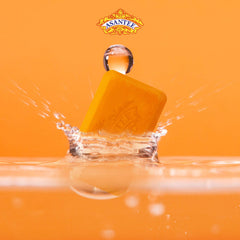 ASANTEE Papaya & Honey soap bar splash illustrating refreshing cleansing.