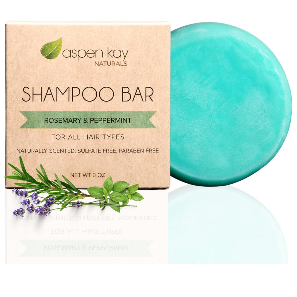 Aspen Kay Naturals solid shampoo bar rosemary peppermint closeup; travel-ready design.