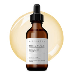 Asterwood Triple Repair Serum bottle on a clean surface for daily anti-aging care.