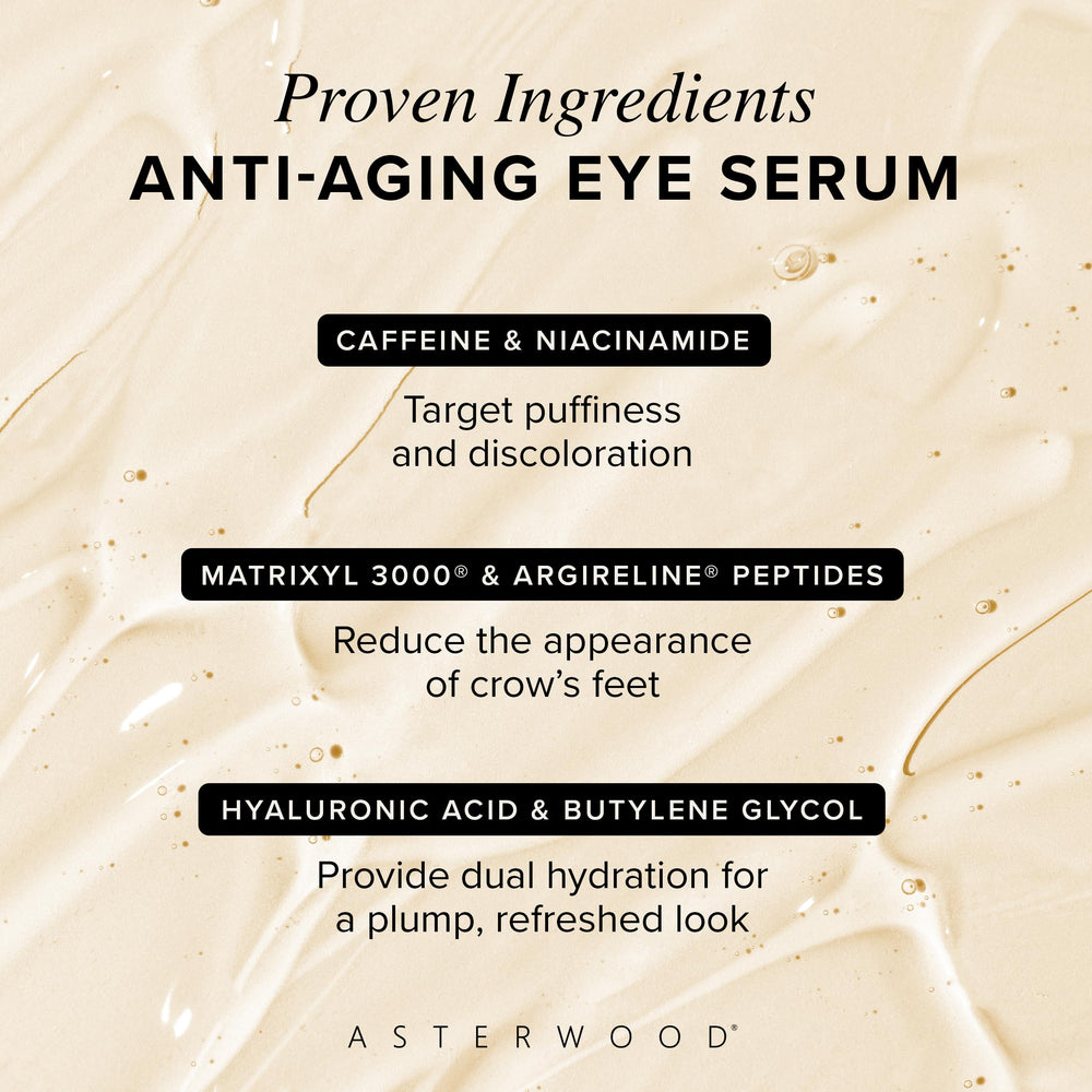 Gently applying serum under the eyes to target fine lines.
