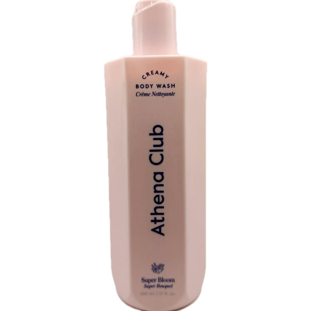 Athena Club Super Bloom bottle being poured to reveal rich creamy lather, ideal for daily cleansing