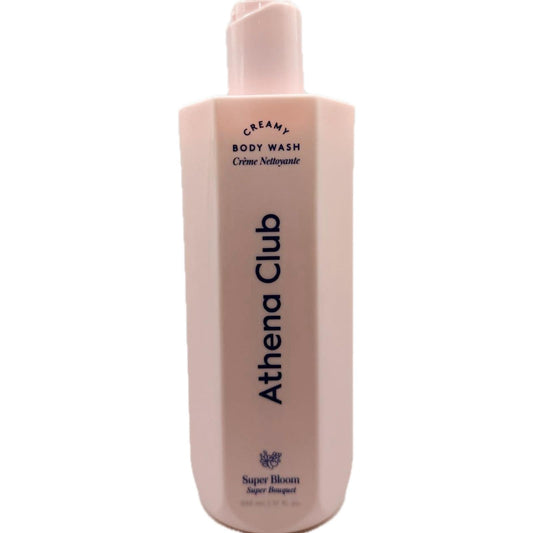 Athena Club Super Bloom bottle being poured to reveal rich creamy lather, ideal for daily cleansing