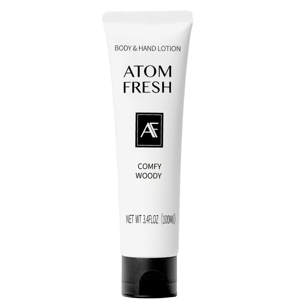 Atom Fresh Hand Cream Comfy Woody bottle front showing fast-absorbing hydration for dry hands.