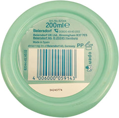Creamy texture swirl of Atrixo hand cream for smooth application