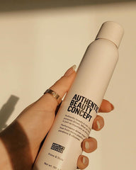 Hair being styled with Amplify Mousse for volumized, natural movement
