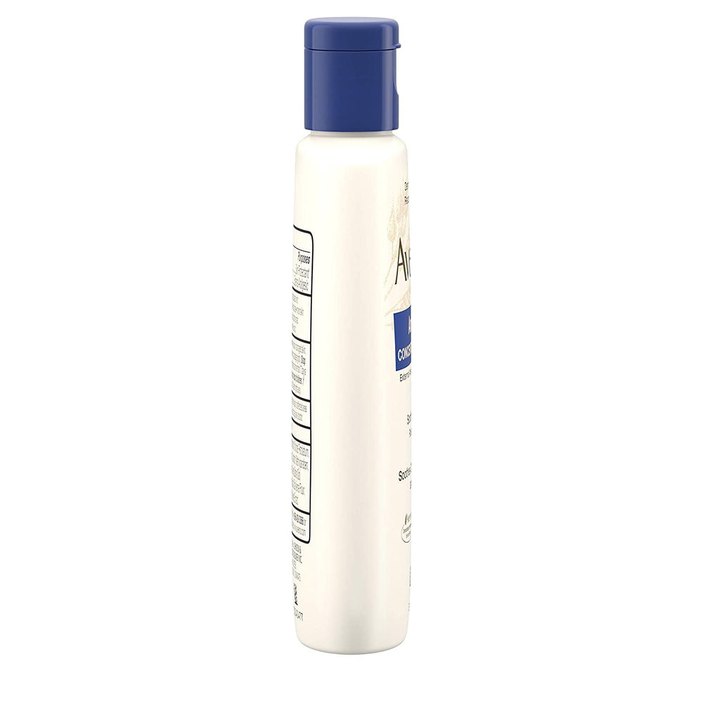 Person applying Aveeno lotion to forearm, skin looks calm and hydrated.