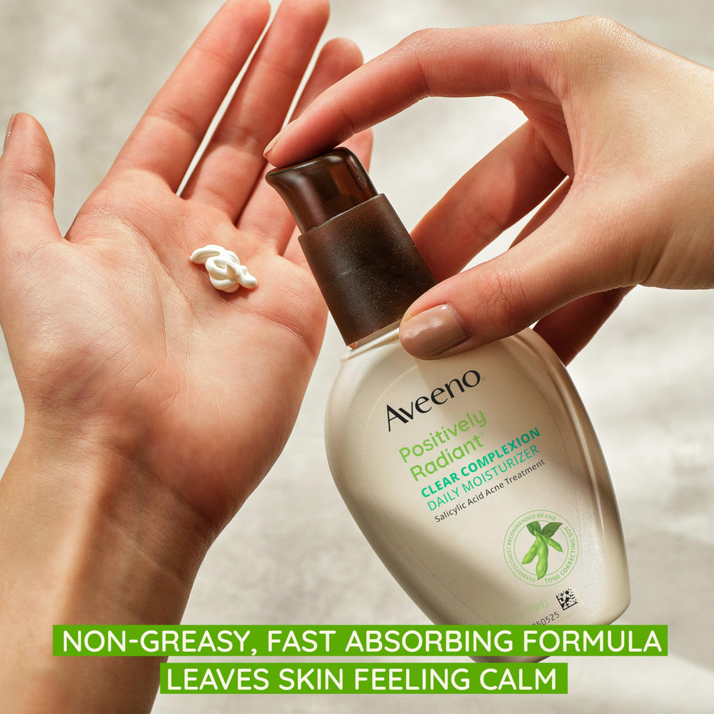 Aveeno noncomedogenic moisturizer shown on clean skin for breakout-prone care.