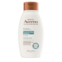 Aveeno Rose Water & Chamomile shampoo bottle front view for dry hair hydration.