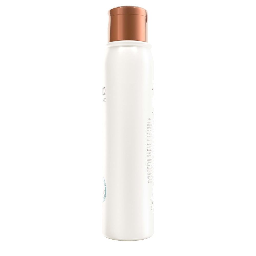 Aveeno bottle beside natural ingredients emphasized in clean formula.