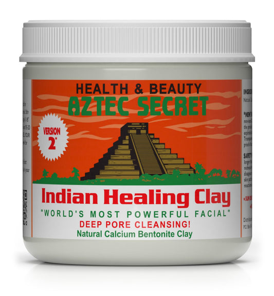 Aztec Secret Indian Healing Clay bottle pour highlighting pure calcium bentonite for deep cleansing.
