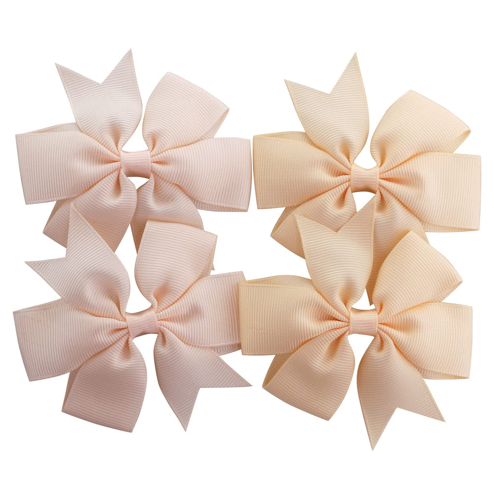 Babymatch pinwheel bow with clip provides secure attachment during active play.