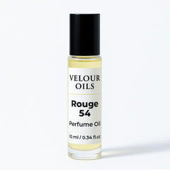 Baccarat Rouge 540 rollerball in use with smooth application.