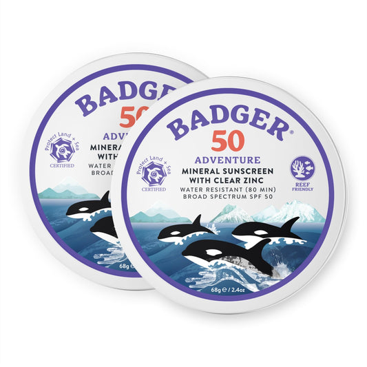 Badger biodegradable reef-safe sunscreen tin with SPF 50 protects skin on outdoor adventures.