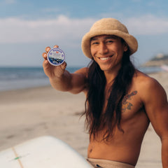 Badger travel-size sunscreen tin ready for carry-on adventures and outdoor activities.