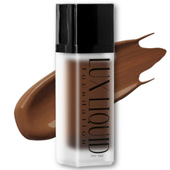 BaeBlu Lux Foundation bottle close-up with sleek packaging; vegan formula and natural finish.