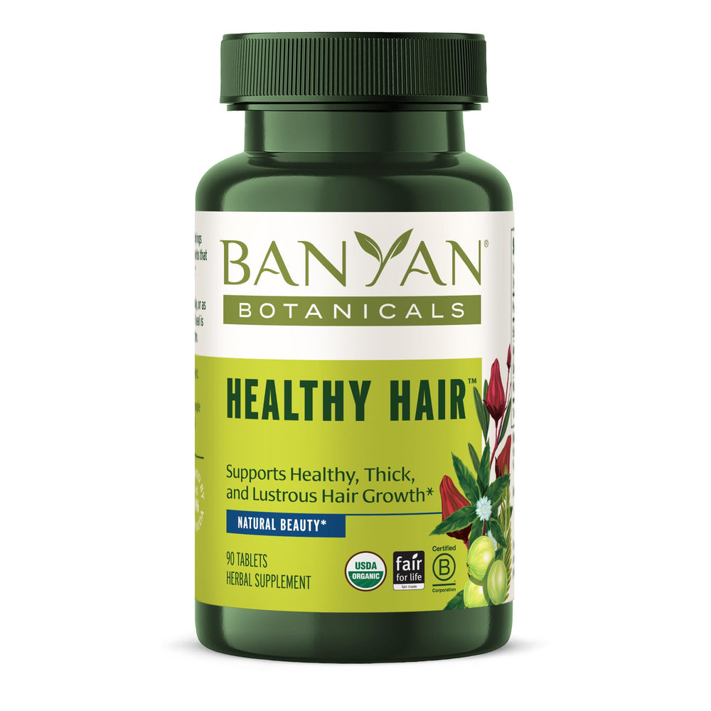Banyan Botanicals Healthy Hair Tablets bottle front, showcasing vegan formula for hair care.