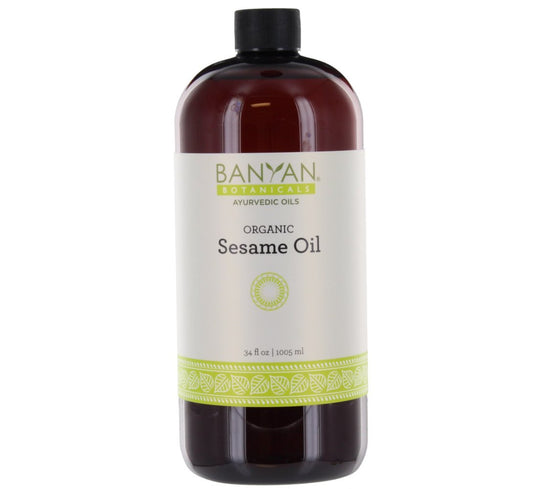 Banyan Botanicals Sesame Oil bottle label shows organic, unrefined formula.