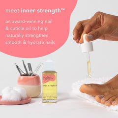 Barefoot Scientist Inner Strength dropper pouring oil for cuticle hydration.