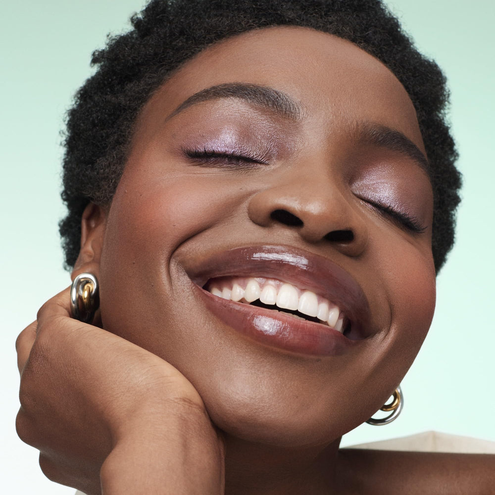 bareMinerals Mineralist Lip Gloss-Balm packaging highlighting vegan, cruelty-free design