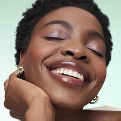 bareMinerals Mineralist Lip Gloss-Balm packaging highlighting vegan, cruelty-free design