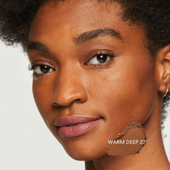 BareMinerals brush-application image suggesting easy blending for daily wear.