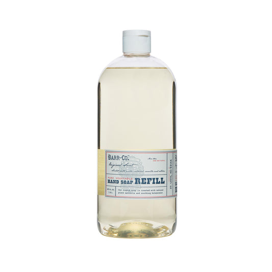 BARR-CO liquid soap refill bottle showing oat vanilla vetiver scent for gentle daily hand cleansing.