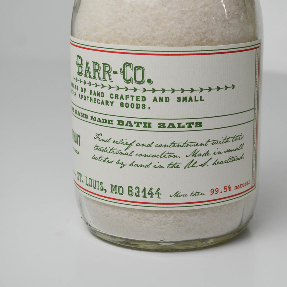 Barr-Co milk bottle glass packaging highlights unique bath salts presentation.