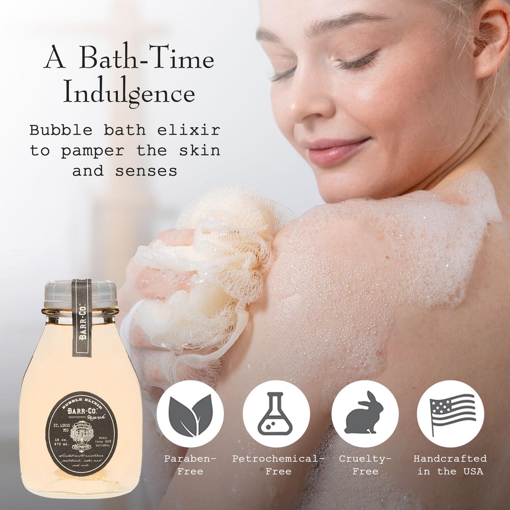 Pouring Barr-Co Reserve Bubble Bath Elixir for a spa-like, richly lathered bath.