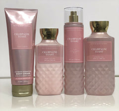 Bath and Body Works Champagne Toast four-piece set displayed on a bathroom vanity for daily pampering.
