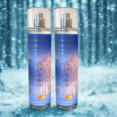 Frosted Coconut Snowball mist in hand, easy everyday spritz and travel-friendly