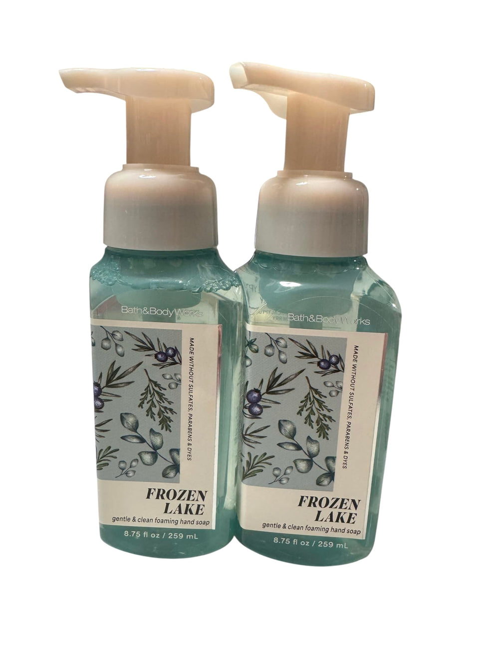 Bath & Body Works Gentle Foaming Hand Soap Frozen Lake bottle pour showing rich foam for clean hands.