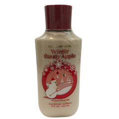 Bath & Body Works Winter Candy Apple lotion 8 oz bottle for quick moisture and softness.