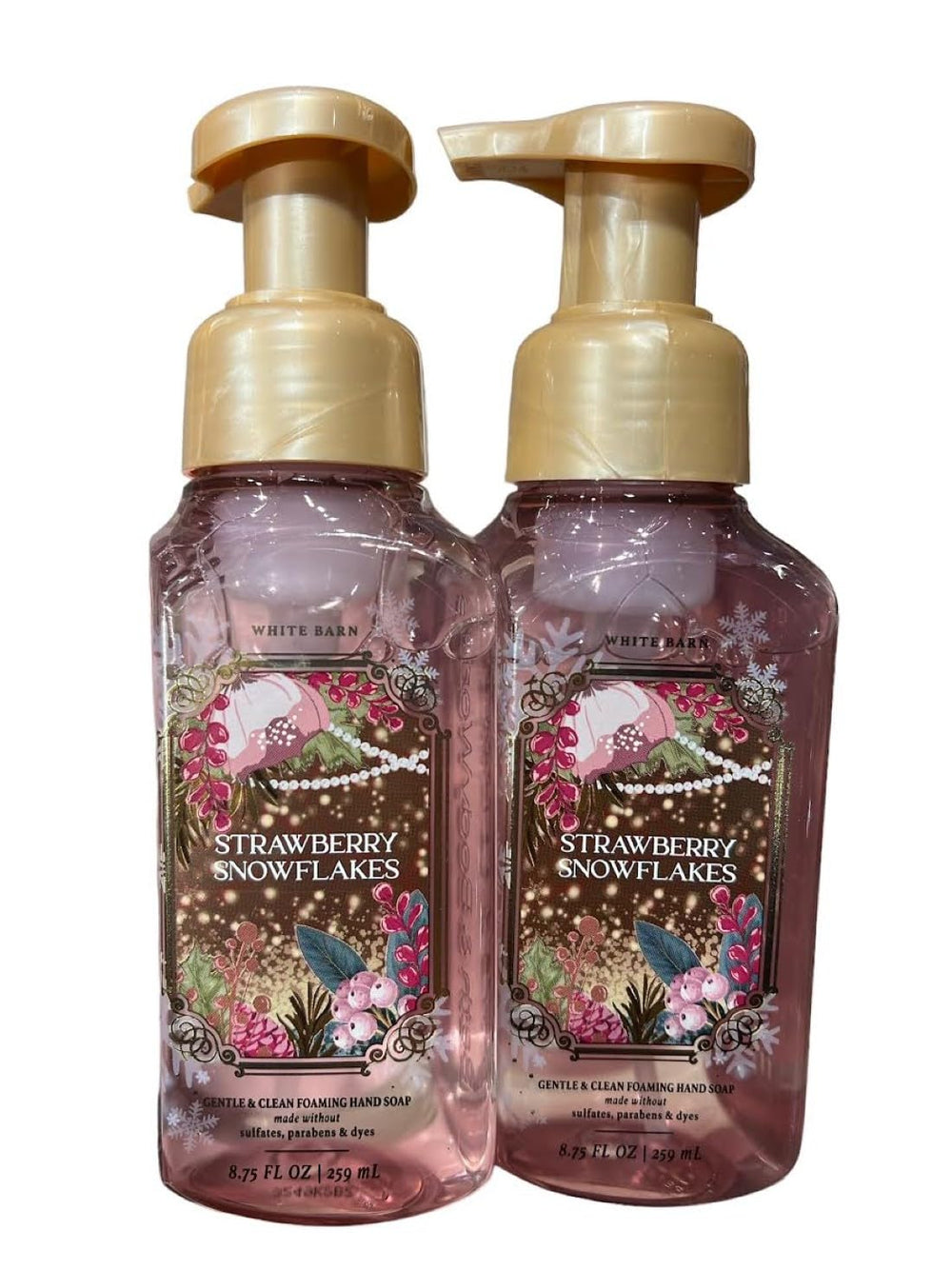 Bath & Body Works foaming hand soap Strawberry Snowflakes bottle with festive design, nourishes hands.