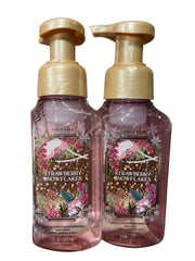 Bath & Body Works Strawberry Snowflakes foaming soap twin bottles offer a soft lather for clean hands.